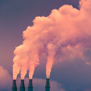 Cooling towers emit steam into the sky. Alkalinity is essential to monitor in industrial water treatment to guard against damaging corrosion.